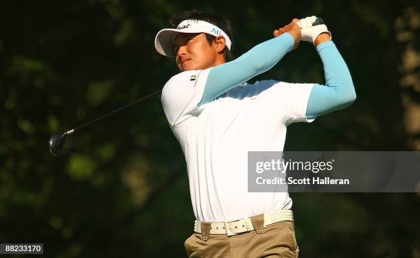 Ryuji Imada of Japan watches his tee shot on the 14th hole during the second round of the Memorial Tournament at the Muirfield Village Golf Club on...