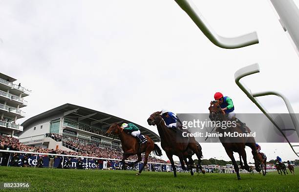 Ask ridden by Ryan Moore wins the Investec Corination Cup run at Epsom Racecourse on June 5, 2009 in Epsom, England.