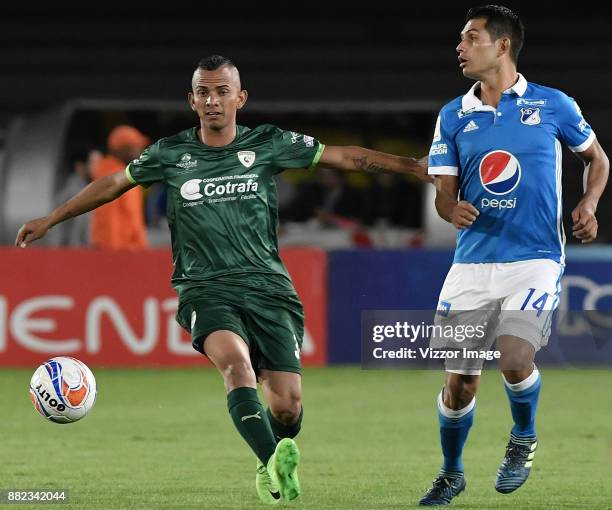 David Macalister Silva of Millonarios fights for the ball with Breiner de Alba of La Equidad during the second leg match for the quarterfinals of the...