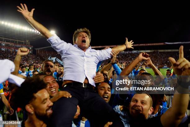 Brazil's Gremio coach Renato Gaucho celebrates after his team defeats Argentina's Lanus during the Copa Libertadores 2017 final football match at...