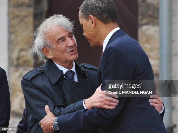 President Barack Obama embraces former Nazi concentration camp inmate Elie Wiesel as they visit the camp at Buchenwald near in the eastern German...