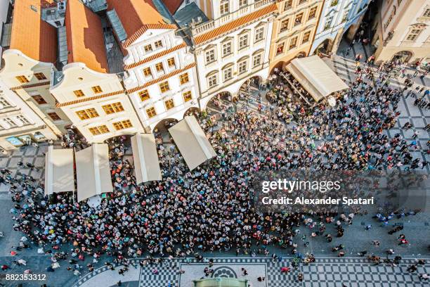 high angle view of tourists at staromestske namesti (old town square) - directly below stock pictures, royalty-free photos & images