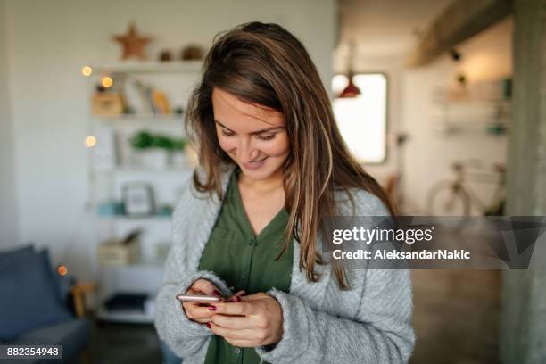 young woman using mobile phone - bachelorette stock pictures, royalty-free photos & images