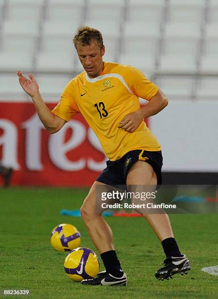 Vincenzo Grella of Australia looks to control the ball during an Australian Socceroos training session at Jassim Bin Hamad Stadium June 5, 2009 in...