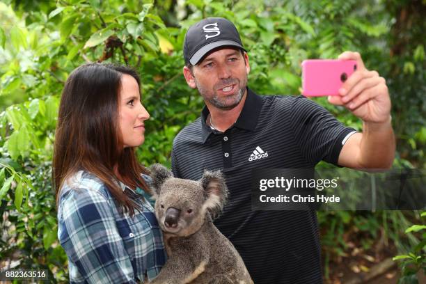 Sergio Garcia and wife Angela Hamann hold a koala during a visit to Currumbin wildlife sanctuary during the 2017 Australian PGA Championship at Royal...