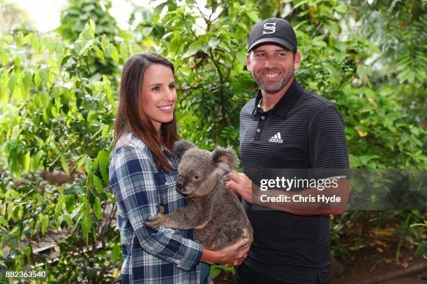 Sergio Garcia and wife Angela Hamann hold a koala during a visit to Currumbin wildlife sanctuary during the 2017 Australian PGA Championship at Royal...