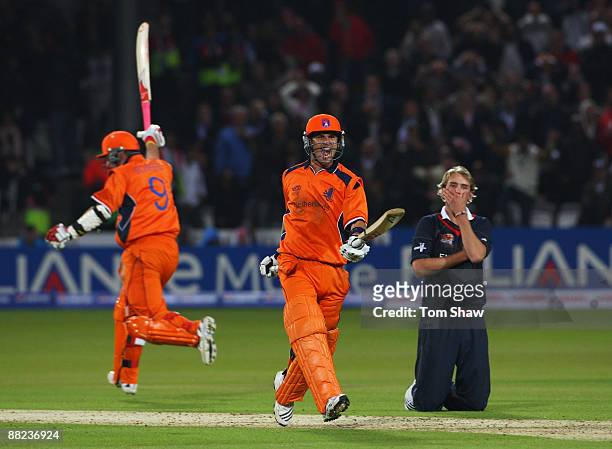 Ryan ten Doeschate of Netherlands celebrates victory with Edgar Schiferli of Netherlands as Stuart Broad of England looks on during the ICC World...