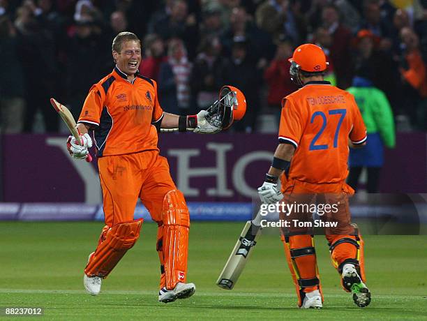 Edgar Schiferli of Netherlands celebrates victory with Ryan ten Doeschate of Netherlands during the ICC World Twenty20 Group B match between England...