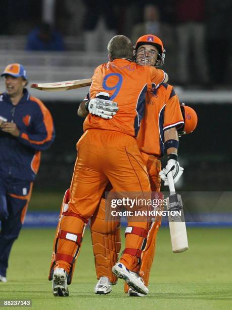 Edgar Schiferli of Netherlands and Ryan ten Doeschate of Netherlands celebrate getting the winning runs and beating England during their ICC World...