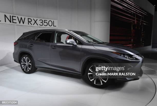 The exterior of the new Lexus RX350 on display at the 2017 LA Auto Show in Los Angeles, California on November 29, 2017. / AFP PHOTO / Mark RALSTON