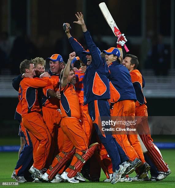 Jeroen Smits of Netherlands celebrates victory with team mates after the ICC World Twenty20 Group B match between England and the Netherlands at...