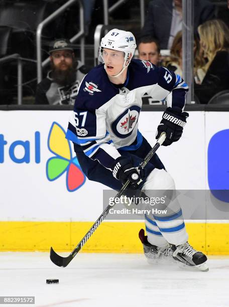 Tyler Myers of the Winnipeg Jets looks to pass during the game against the Los Angeles Kings at Staples Center on November 22, 2017 in Los Angeles,...