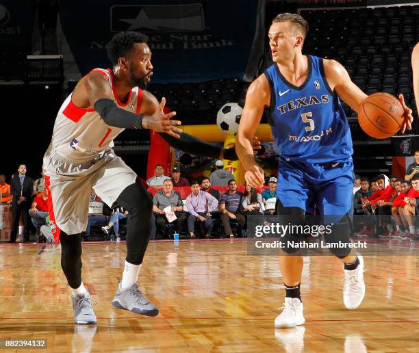 Kyle Collinsworth of the Texas Legends looks for a path around Tony Wroten of the Rio Grande Valley Vipers during an NBA G-League game on November...