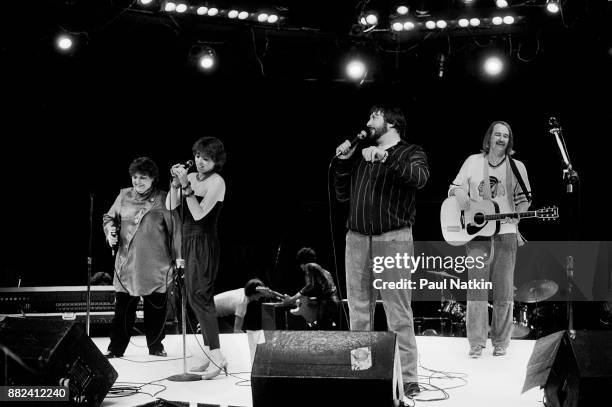 Elaine 'Spanky' McFarlane, MacKenzie Phillips, Denny Doherty and John Phillips of The New Mamas and Papas at the Mill Run Theater in Niles, Illinois,...