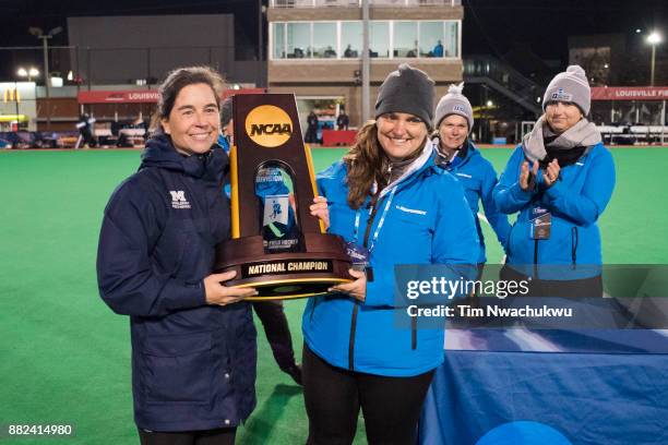 The national title trophy is presented to head coach Katharine DeLorenzo of Middlebury College during the Division III Women's Field Hockey...