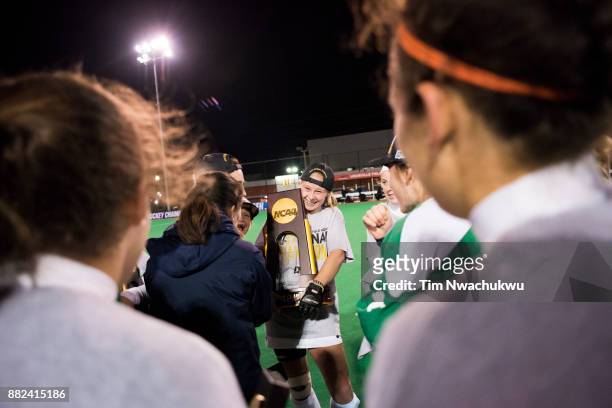 Lauren Schweppe of Middlebury College is congratulated by teammates after being name the tournament Most Outstanding Player during the Division III...