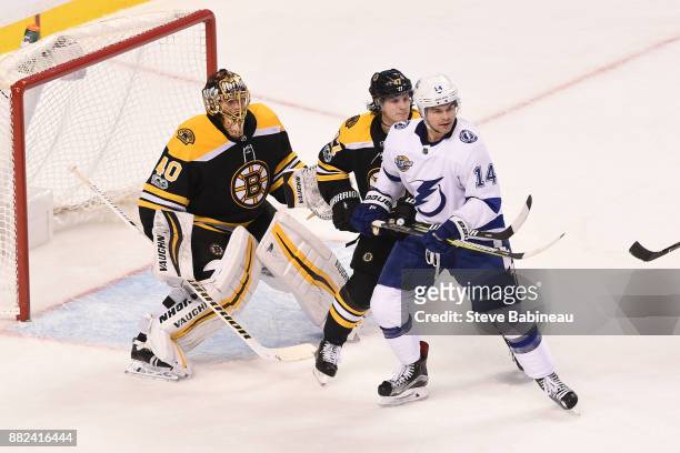 Chris Kunitz of the Tampa Bay Lightning watches the play against Tuukka Rask and Torey Krug of the Boston Bruins at the TD Garden on November 29,...