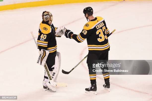 Tuukka Rask and Zdeno Chara of the Boston Bruins celebrate a win against the Tampa Bay Lightning at the TD Garden on November 29, 2017 in Boston,...