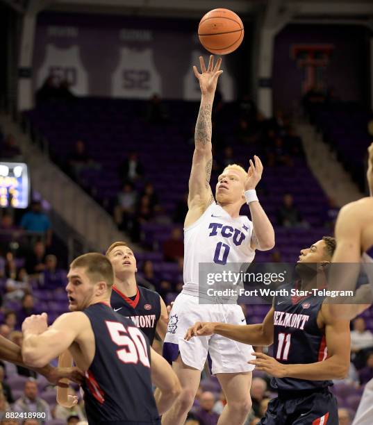 Horned Frogs guard Jaylen Fisher shoots over Belmont Bruins center Seth Adelsperger and guard Kevin McClain as TCU plays Belmont in college...