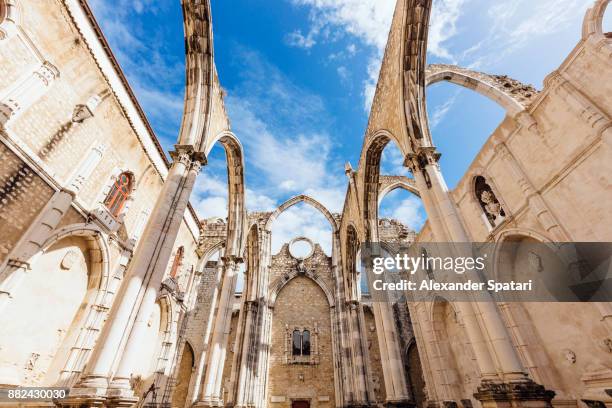 c church ruins in lisbon, portugal - carmo convent stock-fotos und bilder