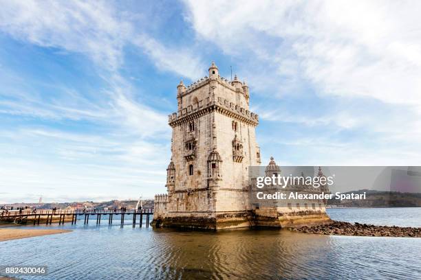 belem tower in lisbon, portugal - torentje stockfoto's en -beelden