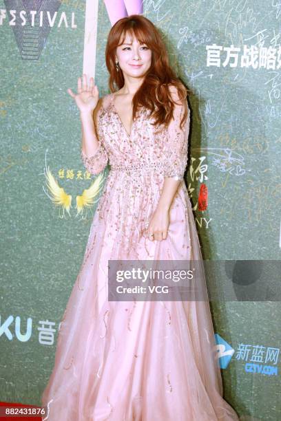 South Korean singer Lee Chae-Yeon poses on the red carpet of 2017 Asia Music Festival on November 29, 2017 in Shanghai, China.