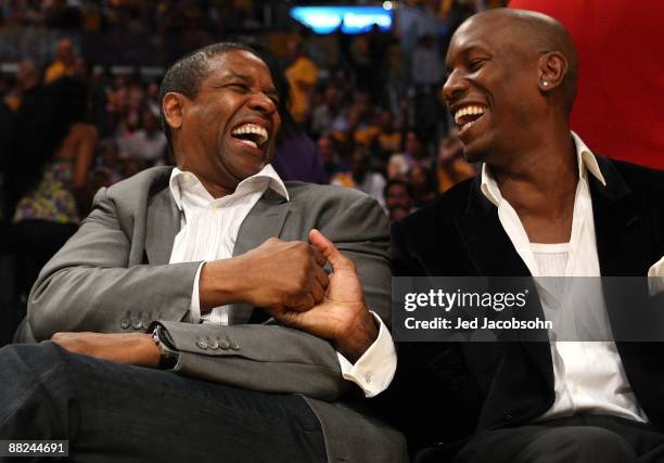 Actors Denzel Washington and Tyrese Gibson sit courtside at Game One of the 2009 NBA Finals between the Los Angeles Lakers and the Orlando Magic in...