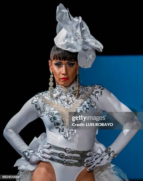 Man of the LGBTI community models a creation by Colombian designer Diego Morales during the Walkway Inclusion fashion show in Cali, Colombia on...