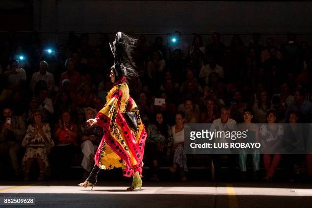 Man of the LGBTI community models a creation by Colombian designer Diego Morales during the Walkway Inclusion fashion show in Cali, Colombia on...