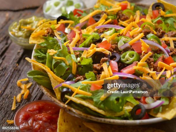 beef taco salad - cheddar cheese stock pictures, royalty-free photos & images