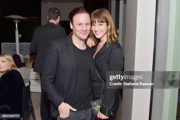 Nicholas Kirkwood and Fuschia Kate Sumner attend Nicholas Kirkwood and China Chow Host A Dinner For Matches Fashion on November 29, 2017 in Los...