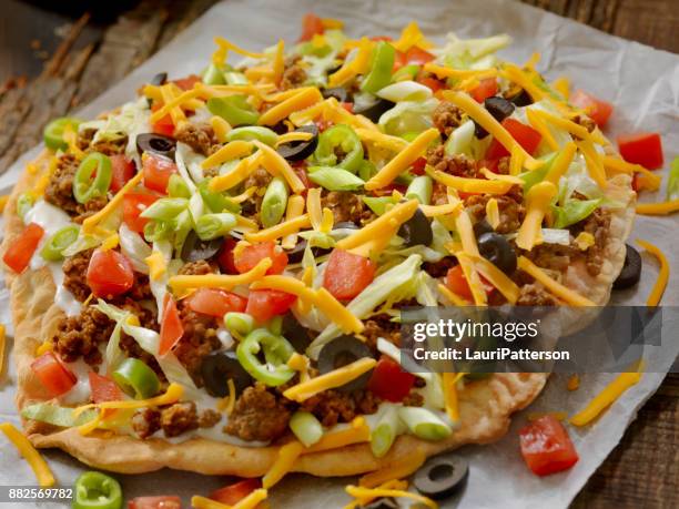 beef taco salad pizza - taco salad stock pictures, royalty-free photos & images
