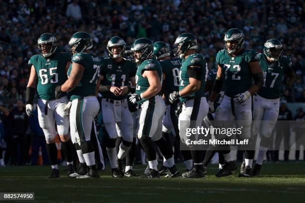 Lane Johnson, Brandon Brooks, Carson Wentz, Jason Kelce, Zach Ertz, Stefen Wisniewski, Halapoulivaati Vaitai, and Alshon Jeffery of the Philadelphia...