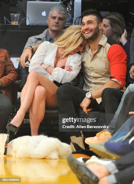 Britney Spears and Sam Asghari attend a basketball game between the Los Angeles Lakers and the Golden State Warriors at Staples Center on November...