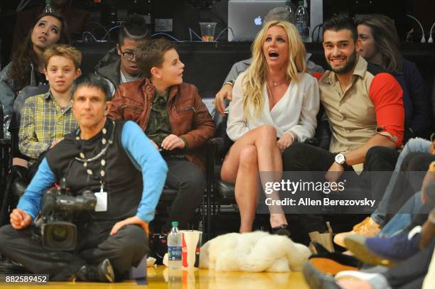 Sean Federline, Jayden James Federline, Britney Spears and Sam Asghari attend a basketball game between the Los Angeles Lakers and the Golden State...