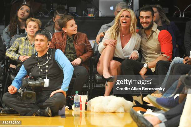 Sean Federline, Jayden James Federline, Britney Spears and Sam Asghari attend a basketball game between the Los Angeles Lakers and the Golden State...