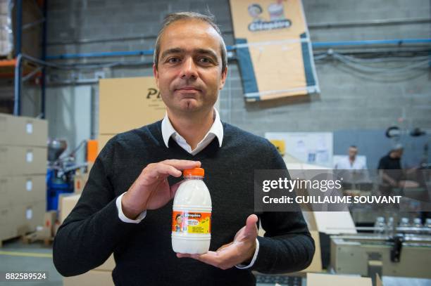 In this photograph taken on November 28 Chief Executive Officer of Cléopâtre glue company Alexandre Marionnet poses at the company plant at...