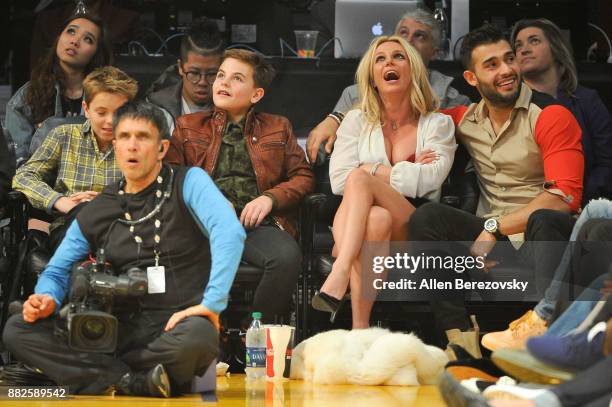 Sean Federline, Jayden James Federline, Britney Spears and Sam Asghari attend a basketball game between the Los Angeles Lakers and the Golden State...