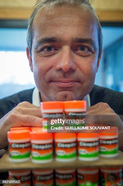 In this photograph taken on November 28 Chief Executive Officer of Cléopâtre glue company Alexandre Marionnet poses at the company plant at...