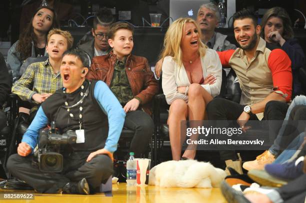 Sean Federline, Jayden James Federline, Britney Spears and Sam Asghari attend a basketball game between the Los Angeles Lakers and the Golden State...