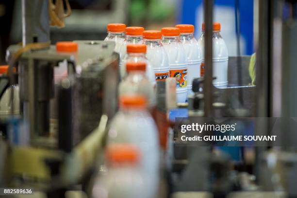 This photograph taken on November 28 shows Cléopâtre glue on the production line at the company's manufacturing plant at Ballan-Mire in central...