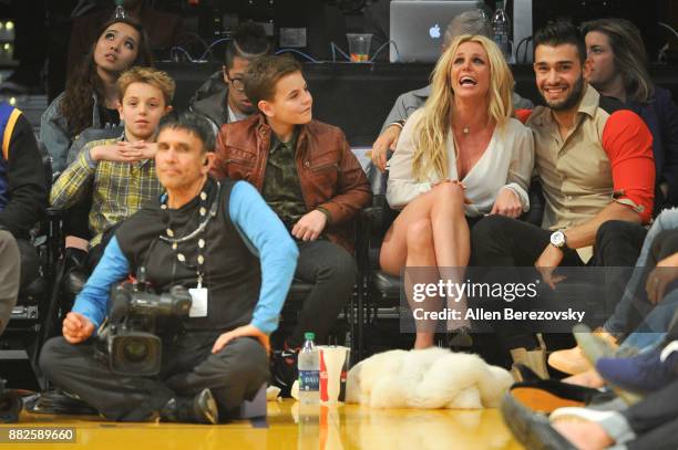 Sean Federline, Jayden James Federline, Britney Spears and Sam Asghari attend a basketball game between the Los Angeles Lakers and the Golden State...