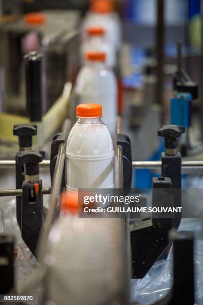 This photograph taken on November 28 shows Cléopâtre glue on the production line at the company's manufacturing plant at Ballan-Mire in central...