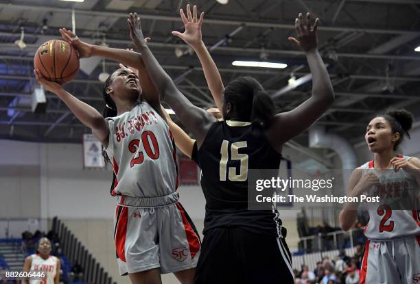 St. John's Cadets center Malu Tshitenge-Mutombo shoots for two in the second half February 27, 2017 in Washington, DC. The St. John's Cadets beat the...