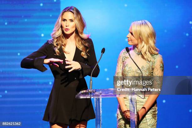 Anna Hutchison and Kimberley Crosman present an award during the NZ TV Awards at Sky City on November 30, 2017 in Auckland, New Zealand.