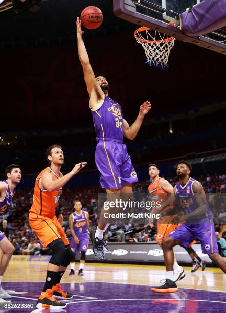 Perry Ellis of the Kings rebounds during the round eight NBL match between the Sydney Kings and the Cairns Taipans at Qudos Bank Arena on November...