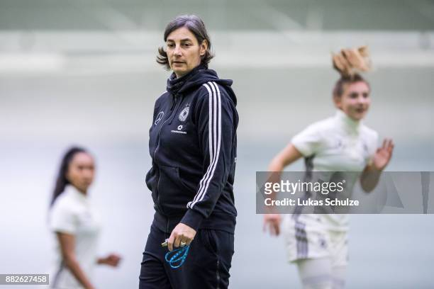 Head Coach Anouschka Bernhard of Germany looks up prior to the U17 Girls friendly match between Finland and Germany at the Eerikkila Sport & Outdoor...