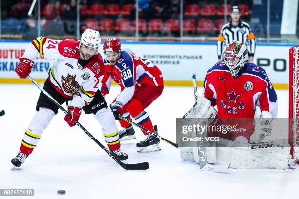 Kyle Chipchura of HC Kunlun Red Star and Lars Johansson of HC CSKA Moscow compete during the 2017/18 Kontinental Hockey League KHL Regular Season...