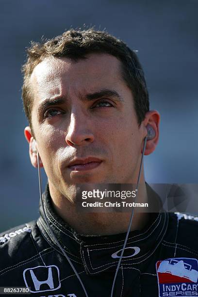 Justin Wilson, driver of the Z-Line Designs Dallara Honda, stands on pit road during qualifying for the IRL IndyCar Series Bombardier Learjet 550k on...