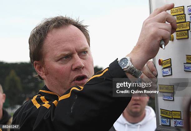 Simon Atkins the coach of Werribee gives instructions during the round nine VFL match between the Casey Scorpions and the Werribee Tigers at Casey...